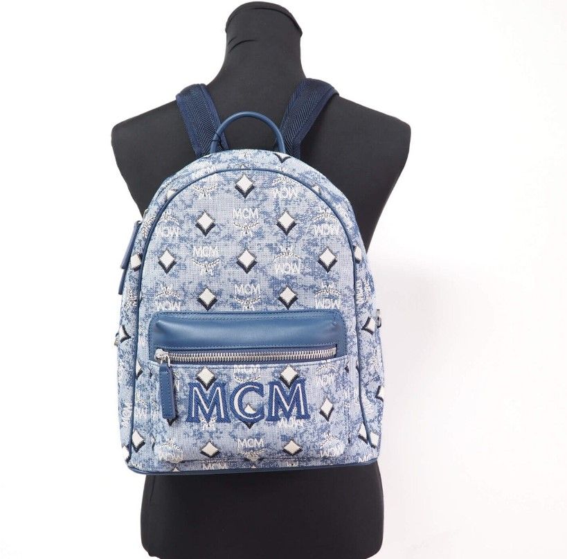 Mochila pequeña de tela con monograma y logotipo en jacquard vintage azul Stark de MCM