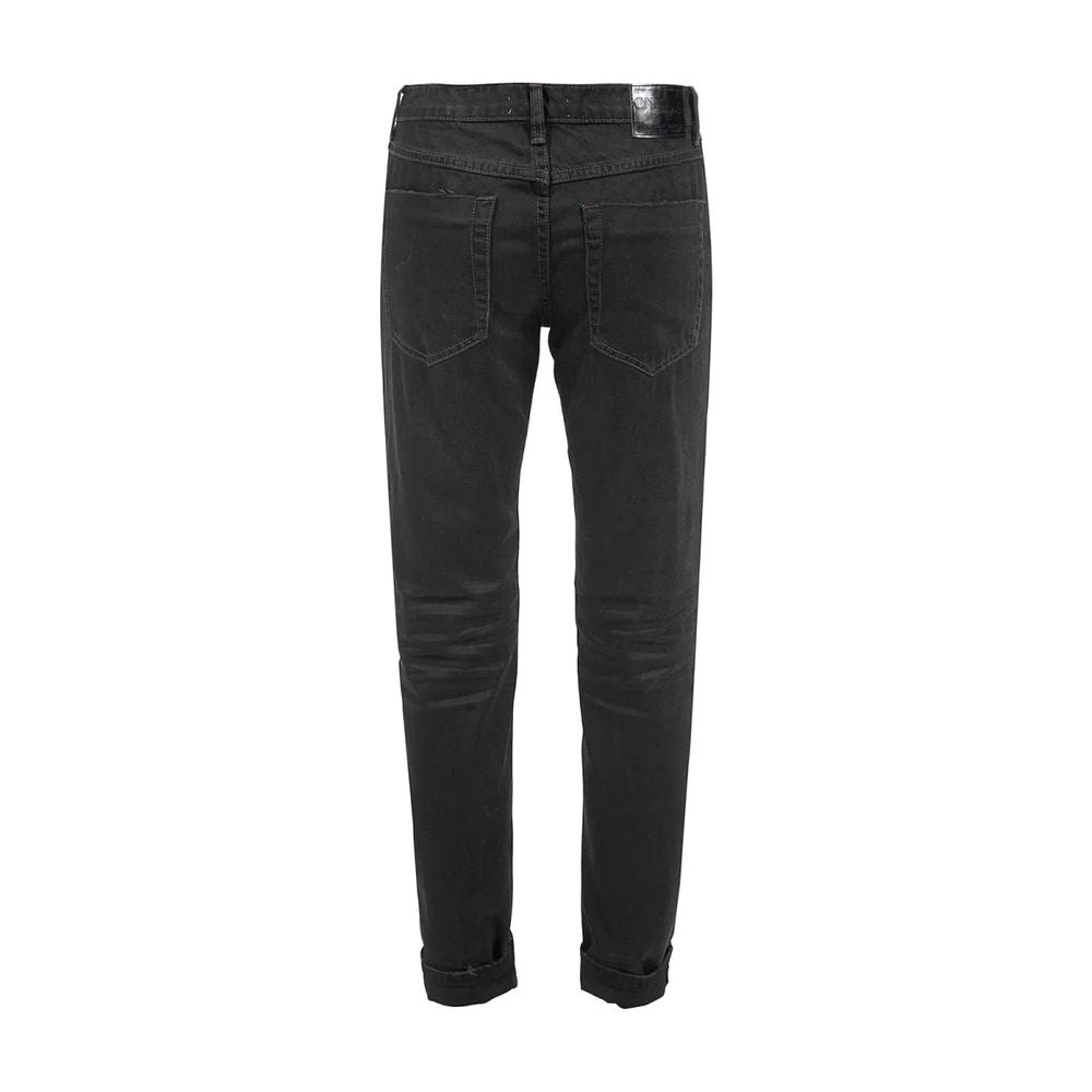 En tesked Chic Black Distressed Patched Jeans