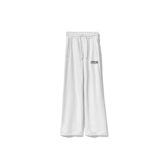 Pantalones deportivos blancos con el logo elegante de Comme Des Fuckdown