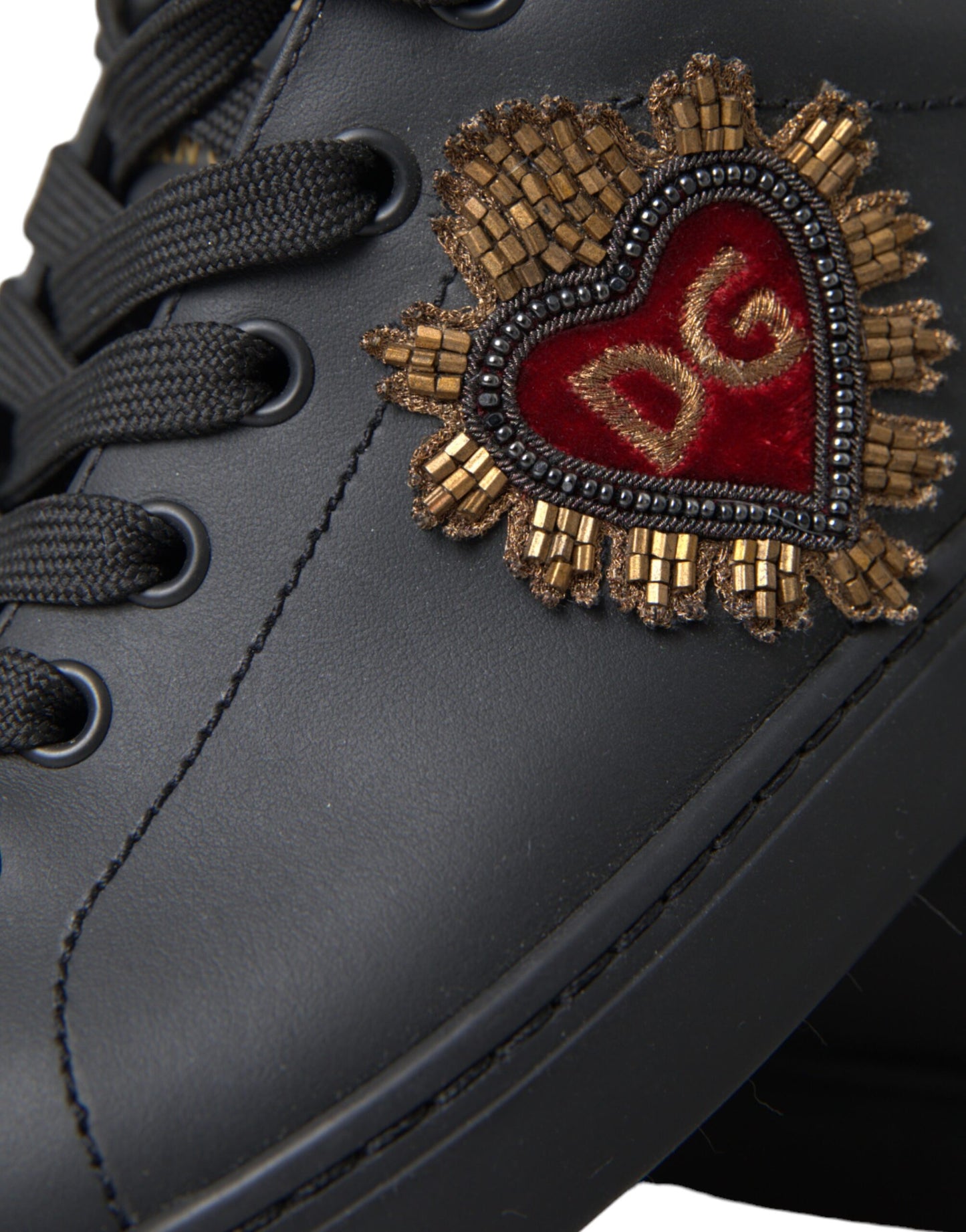 Zapatillas deportivas de piel negra con adornos de corazones de Dolce &amp; Gabbana