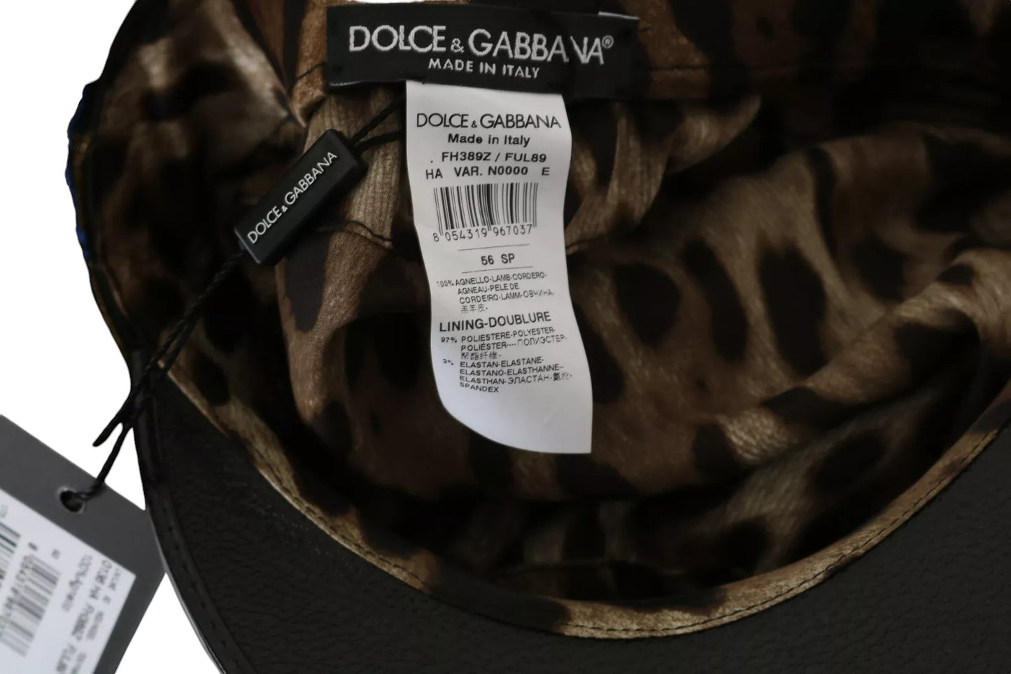 Gorra estilo violinista con lazo dorado y cuentas de cristal de cuero negro de Dolce &amp; Gabbana