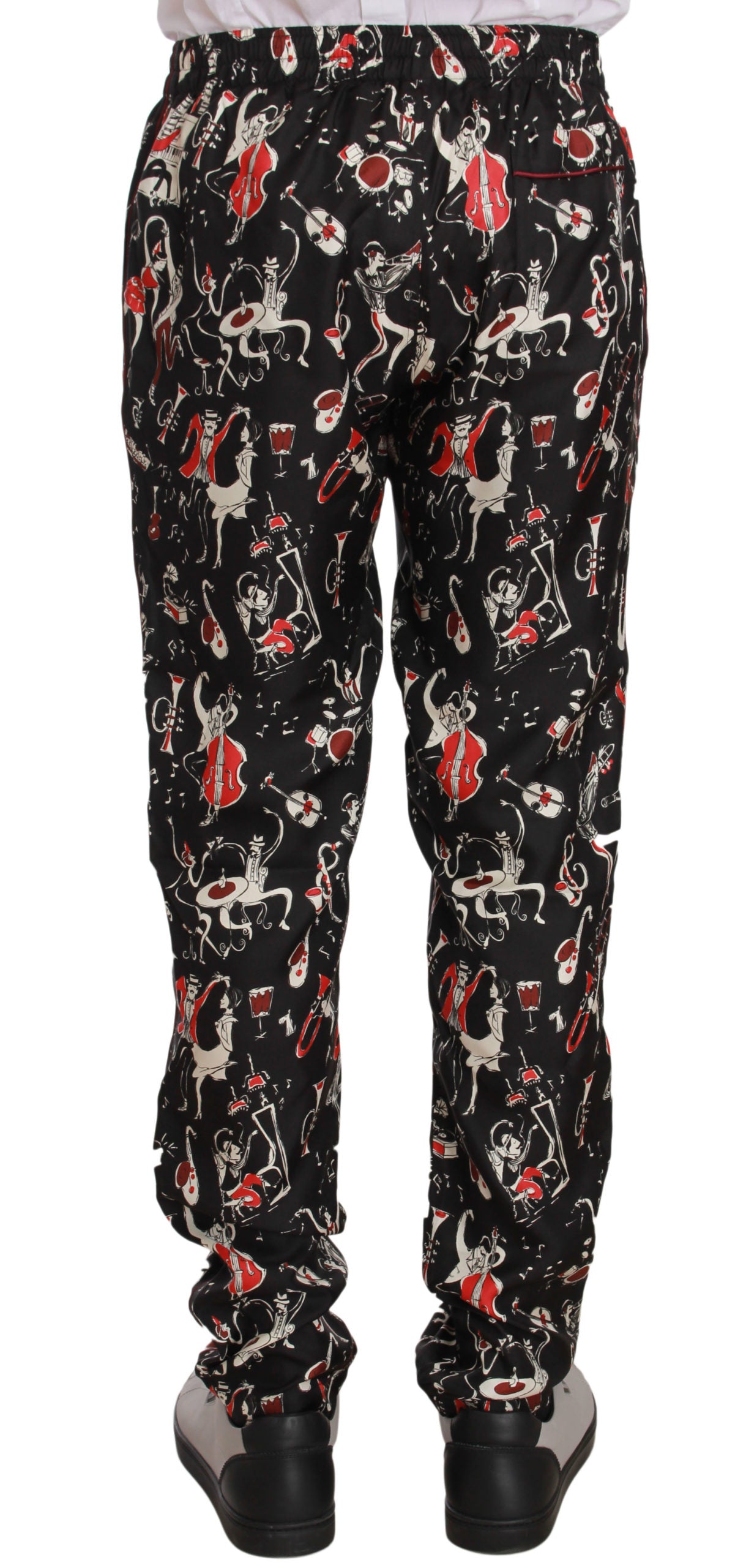 Pantalones elegantes de seda negra con estampado rojo de Dolce &amp; Gabbana