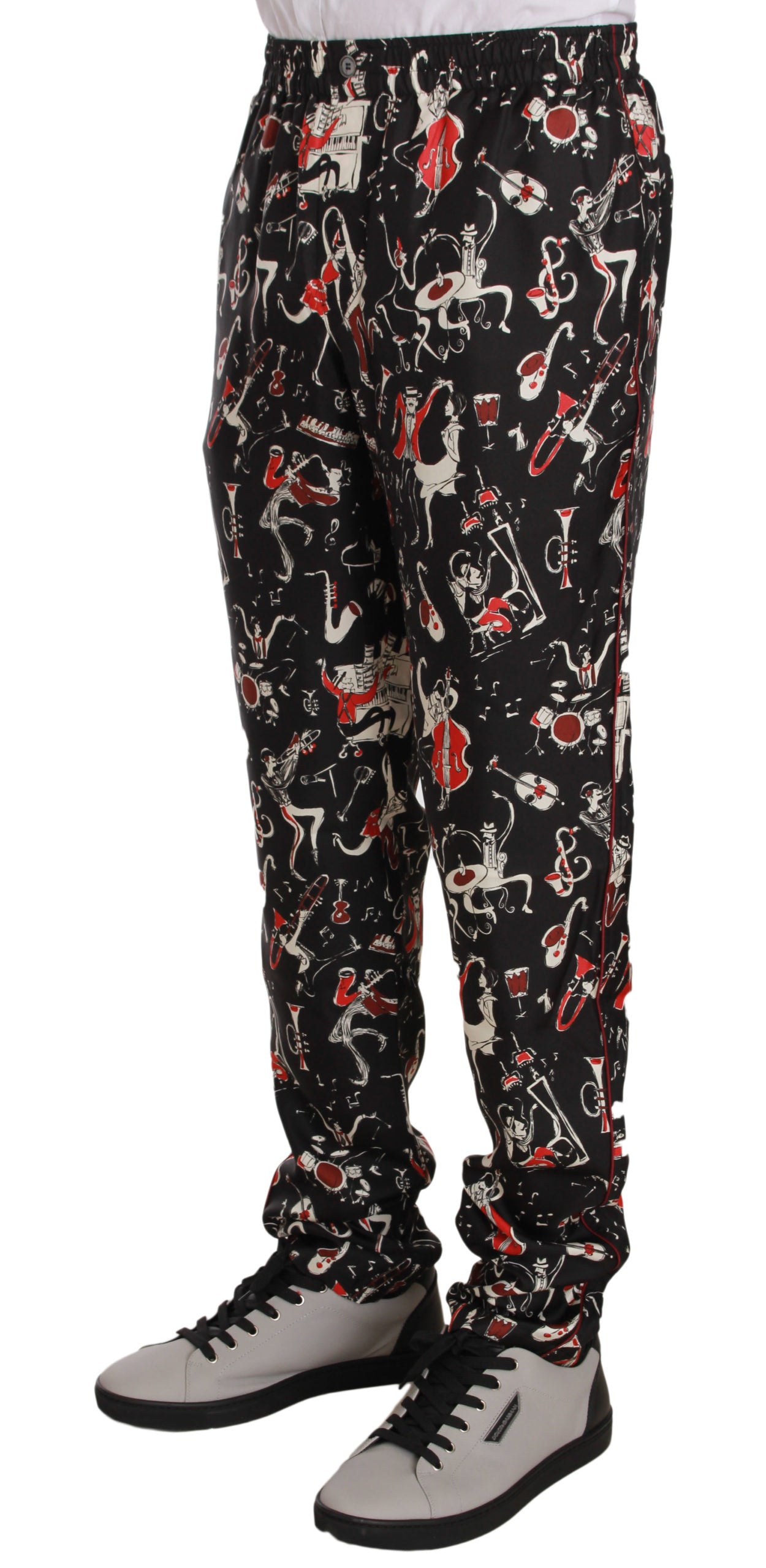 Pantalones elegantes de seda negra con estampado rojo de Dolce &amp; Gabbana